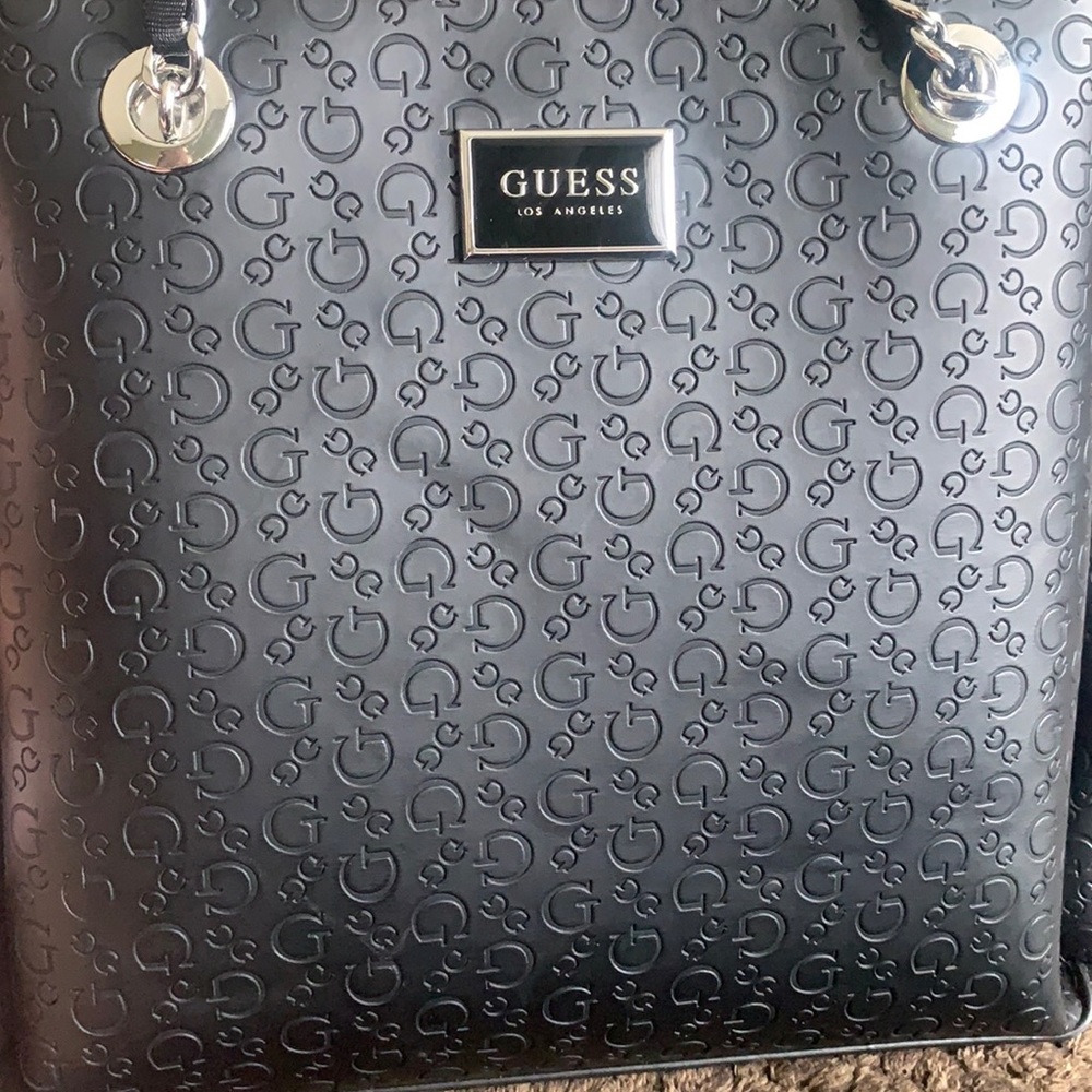 Guess purse fairly new, only used a couple times